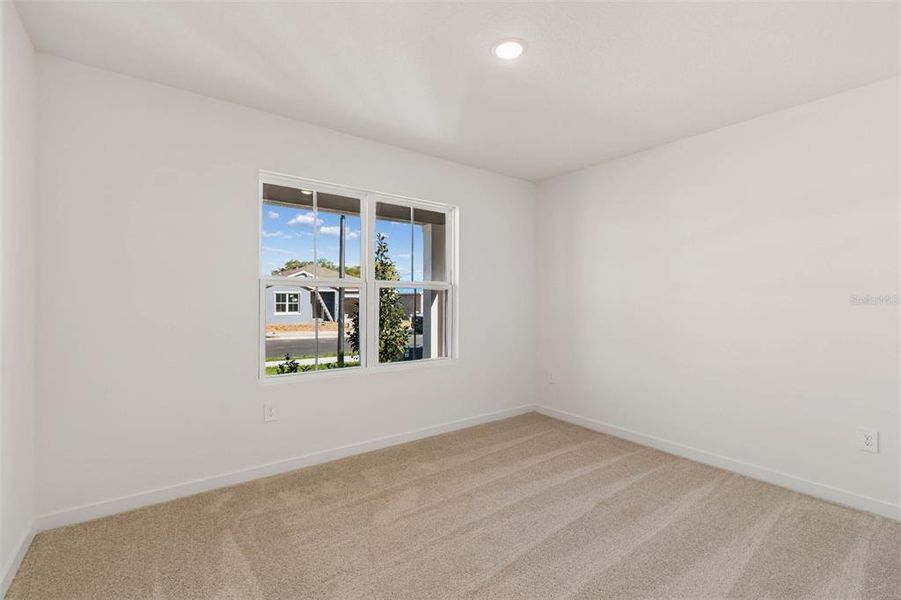 Spacious, unfurnished interior of a new home in Aspire at Canter Creek, Davenport (Image 15).