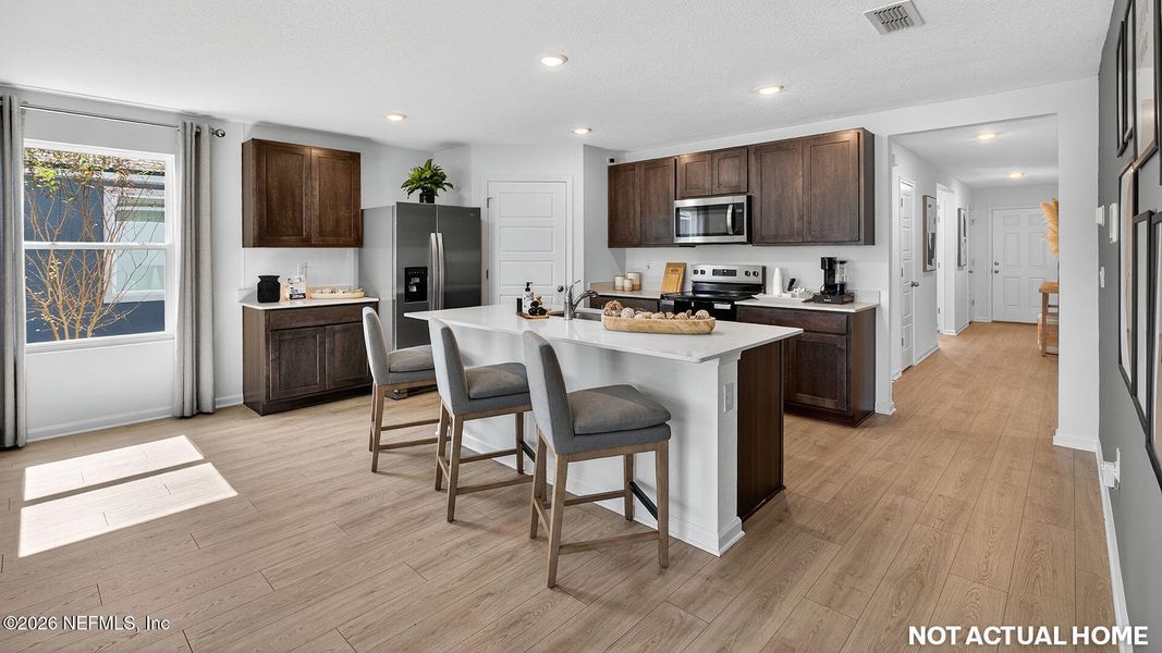 Furnished interior view inside a new home in Rookery, Green Cove Springs (Image 7).