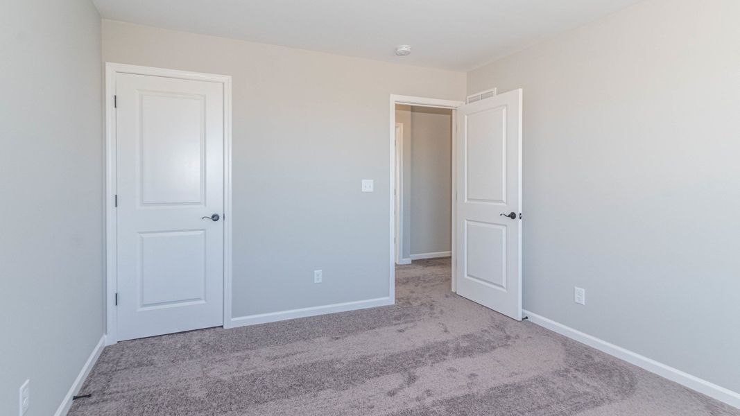 Representative unfurnished interior of a home built from the The Winslow by Norfolk Homes in Valleys, Jackson (Image 102).