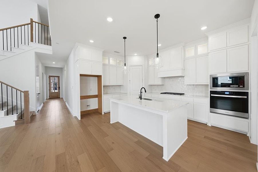 Furnished interior view inside a new home in Light Farms Brenham - 40' Lots, Celina (Image 10).