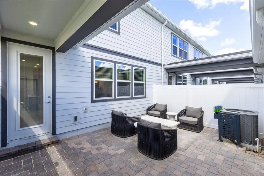 Exterior details and patio area of a home in EverBe, Orlando (Image 22). Exterior details and patio area of a home in EverBe, Orlando (Image 22).