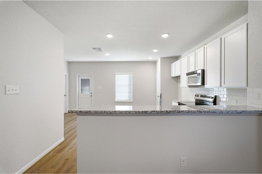 Furnished interior view inside a new home in Notting Hill, Converse (Image 6).