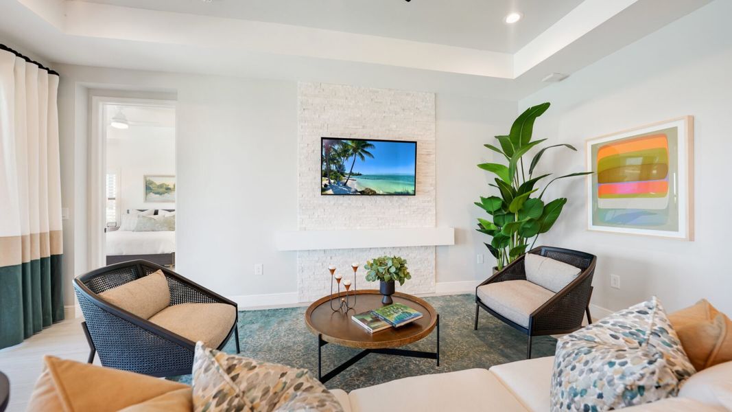 Representative furnished interior of a home built from the Meadow Brook by Neal Communities in SkySail, Naples (Image 9).