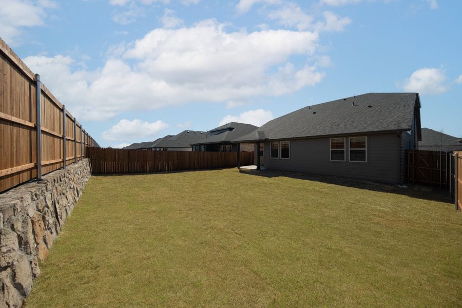 Exterior details and patio area of a home in Verandah, Royse City (Image 3).