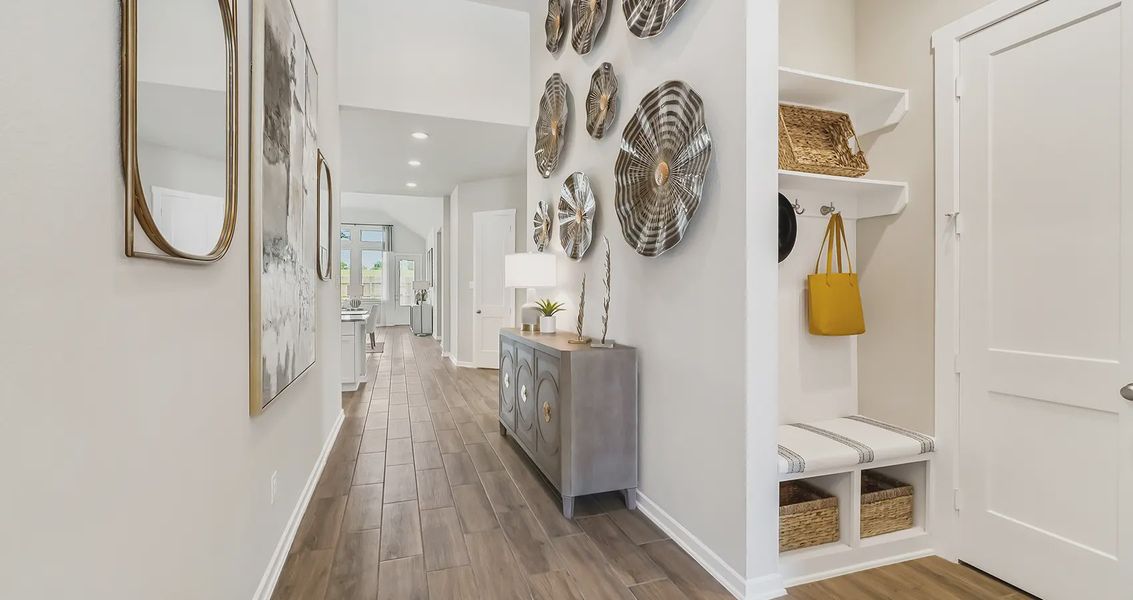Representative furnished interior of a home built from the Lynnbrook by Chesmar Homes in Sienna Chateau, Missouri City (Image 4).