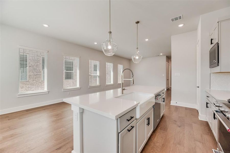 Furnished interior view inside a new home in Collin Creek, Plano (Image 8).