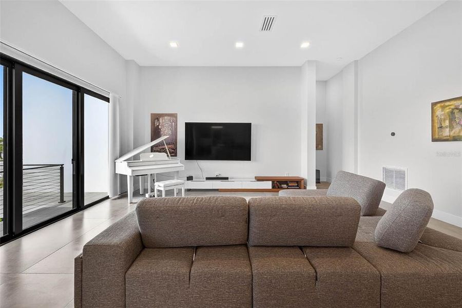 Furnished interior view inside a new home in , Redington Shores (Image 18).