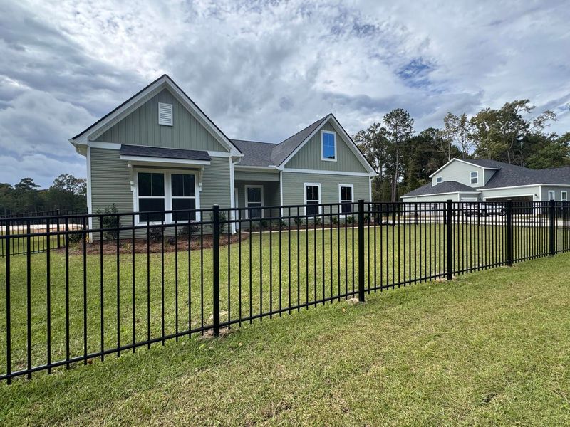 Front exterior of a new home in Central Estates, Summerville, SC, highlighting curb appeal (Image 21).