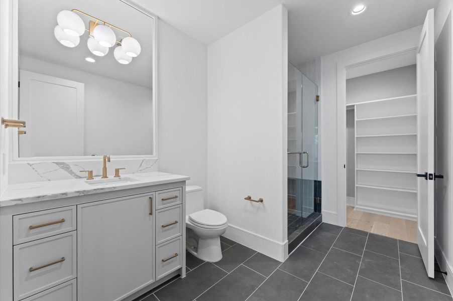 3rd bath w/ shower and walk in closet perfect for guests.