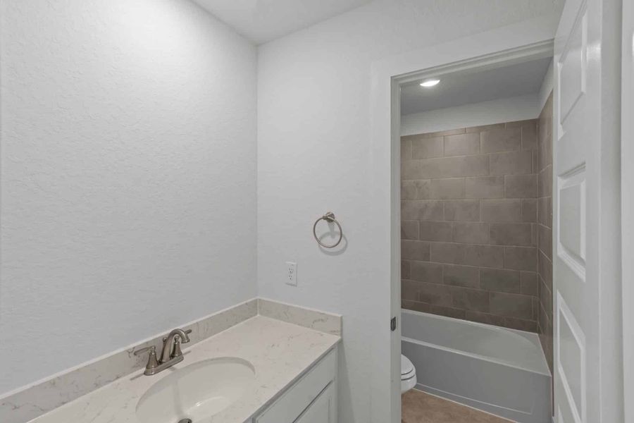 Furnished interior view inside a new home in Buffalo Crossing – New Phase Now Preselling, Cibolo (Image 15).