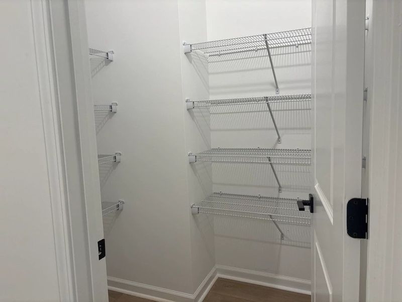 Pantry featuring the AW Collection® Serene - Sleek storage framed by clean design.