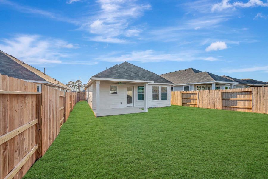 Exterior details and patio area of a home in Lone Star Landing, Montgomery (Image 21).