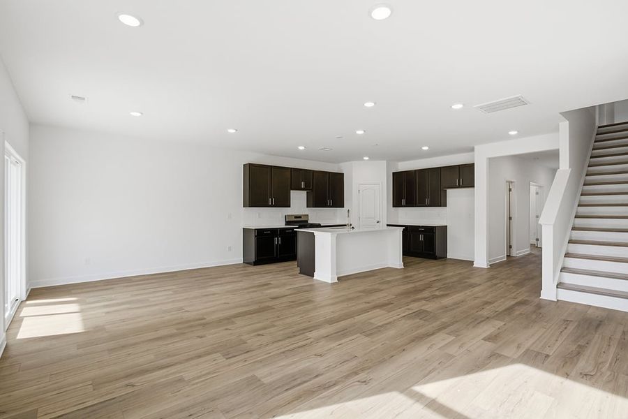 A large empty living room. A large empty living room.