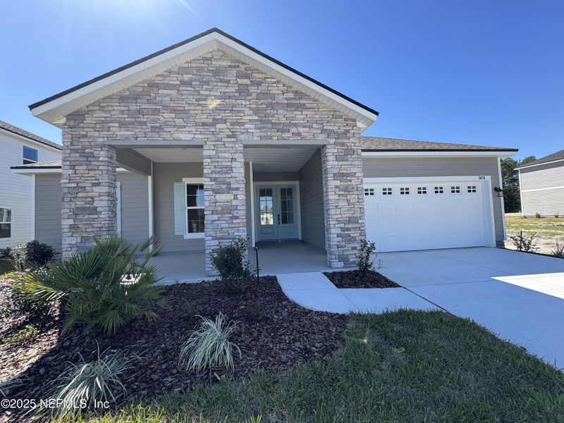 Front exterior of a new home in , Green Cove Springs, FL, highlighting curb appeal (Image 18).