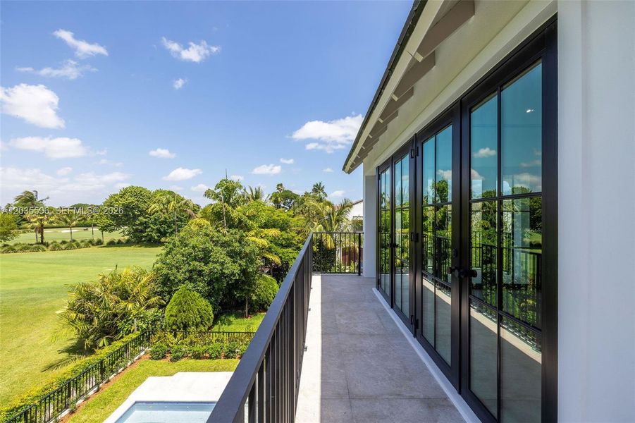 Primary bedroom balcony overlooks gold course Primary bedroom balcony overlooks gold course