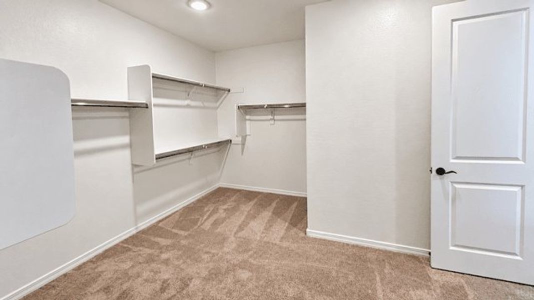 Spacious, unfurnished interior of a new home in The Grove at El Cidro, Goodyear (Image 7).