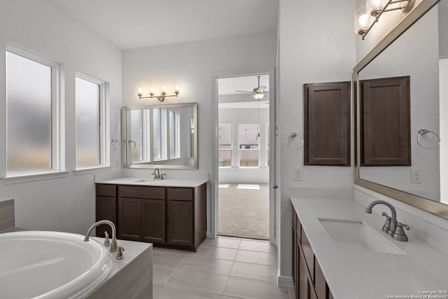 Furnished interior view inside a new home in Stillwater Ranch 60', San Antonio (Image 4).