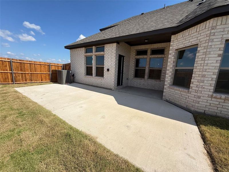 Exterior details and patio area of a home in Mercer Meadows, Royse City (Image 3).