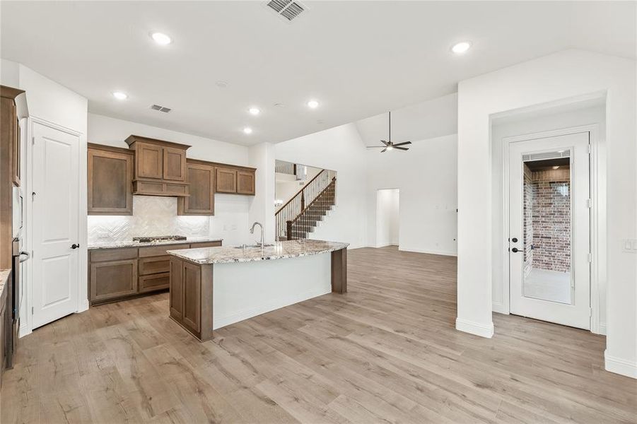Furnished interior view inside a new home in Stone River Glen 60s, Royse City (Image 10).