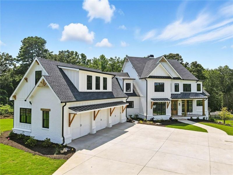 Front exterior of a new home in , Canton, GA, highlighting curb appeal (Image 24).
