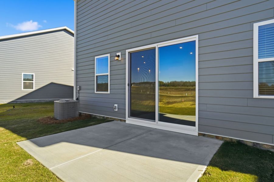 Exterior details and patio area of a home in Waxhaw Landing, Monroe (Image 4). Exterior details and patio area of a home in Waxhaw Landing, Monroe (Image 4).