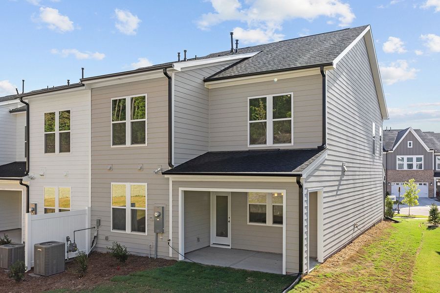 Exterior details and patio area of a home in Ovation at Sweetbrier, Durham (Image 21).