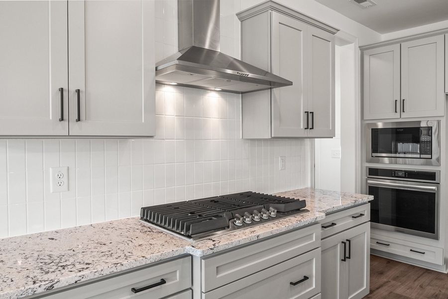 Representative furnished interior of a home built from the The Whitley by RobuckHomes in Windwater, Hampstead (Image 11).