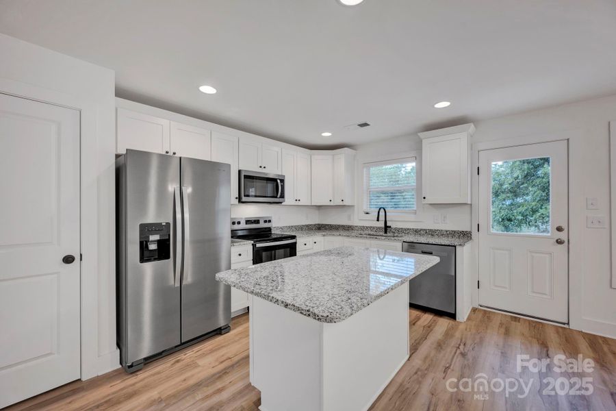 Furnished interior view inside a new home in , Concord (Image 7).