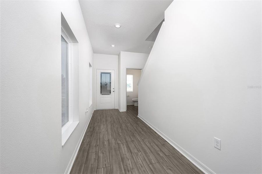 Furnished interior view inside a new home in Tula Parc, Astatula (Image 5).