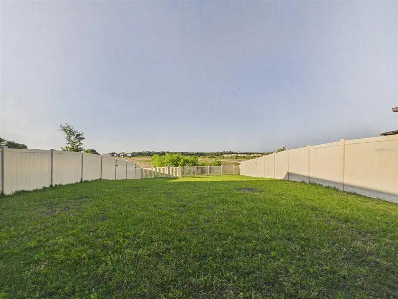 Exterior details and patio area of a home in Two Rivers, Zephyrhills (Image 4).