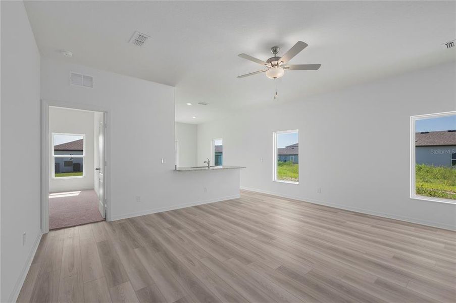 Spacious, unfurnished interior of a new home in Gum Lake Preserve, Lake Alfred (Image 20).