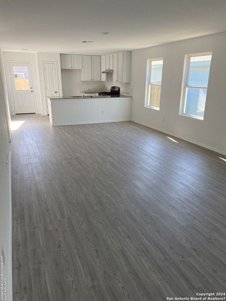 Spacious, unfurnished interior of a new home in , San Antonio (Image 5). Spacious, unfurnished interior of a new home in , San Antonio (Image 5).