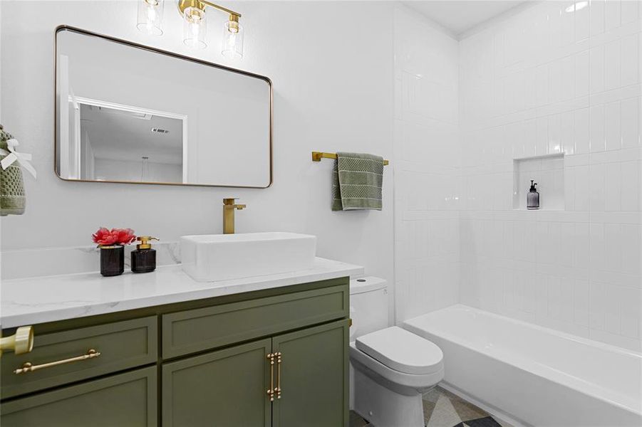 3rd Bathroom on the 2nd floor with vanity and shower / washtub combination with tile wall to the ceiling and soap box. 3rd Bathroom on the 2nd floor with vanity and shower / washtub combination with tile wall to the ceiling and soap box.