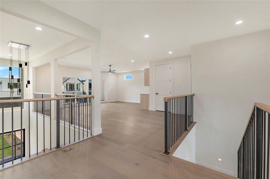 Hallway featuring light hardwood / wood-style flooring