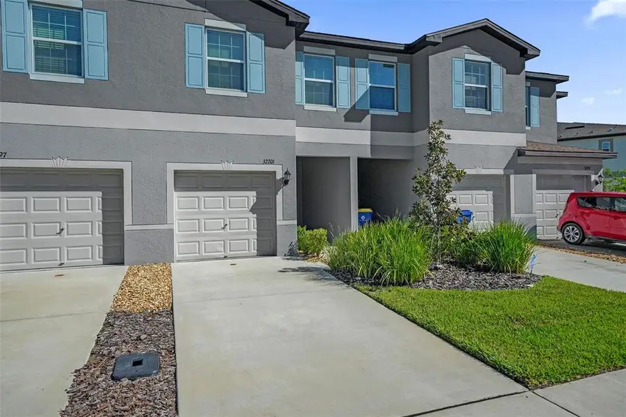 Front exterior of a new home in , San Antonio, FL, highlighting curb appeal (Image 22). Front exterior of a new home in , San Antonio, FL, highlighting curb appeal (Image 22).