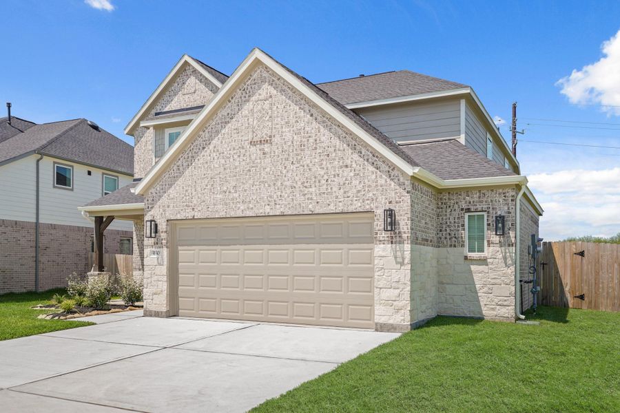 Front exterior of a new home in Briarwood Crossing, Rosenberg, TX, highlighting curb appeal (Image 20). Front exterior of a new home in Briarwood Crossing, Rosenberg, TX, highlighting curb appeal (Image 20).