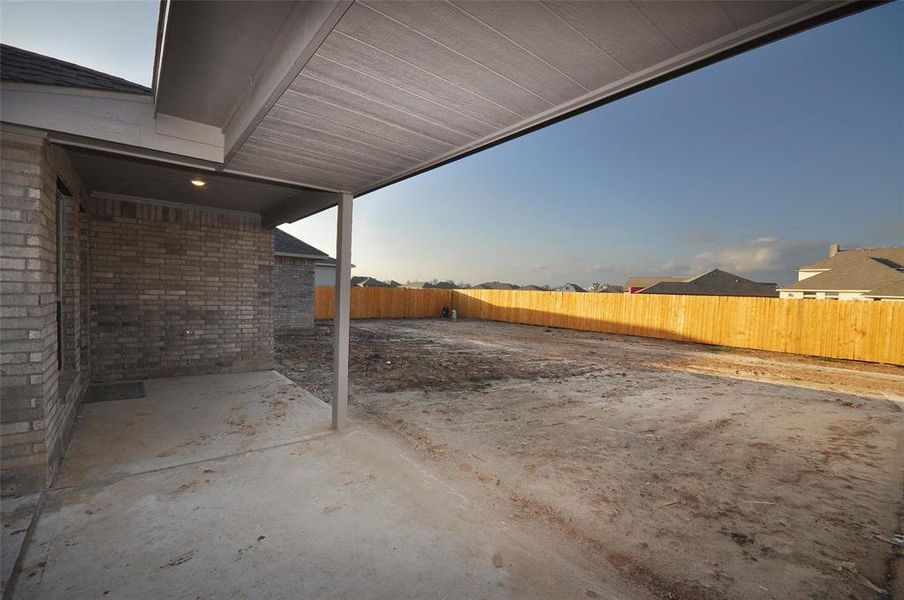 Off the Breakfast room, enjoy this covered patio and breezeway.