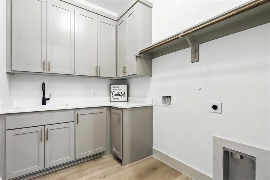 Big laundry room with plenty of storage!