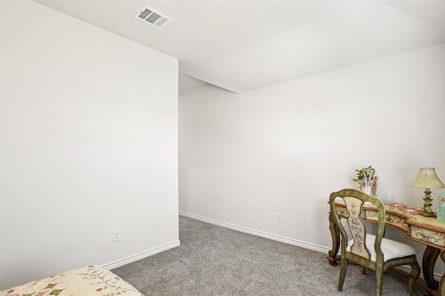 Office space featuring carpet flooring and baseboards Office space featuring carpet flooring and baseboards