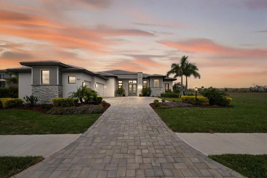 Front exterior of a new home in , Bradenton, FL, highlighting curb appeal (Image 28).
