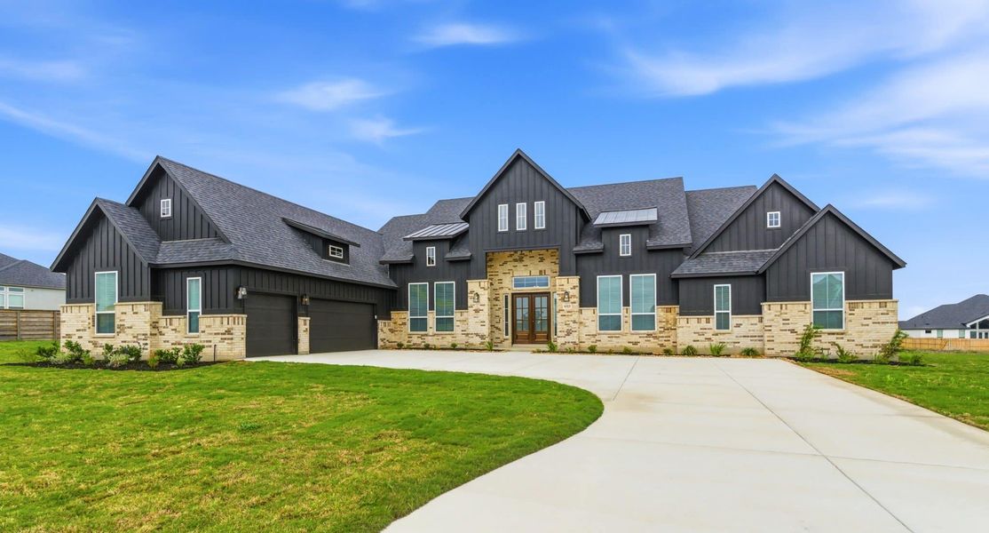 Front exterior of a new home in Regency Ranch, Marion, TX, highlighting curb appeal (Image 31).