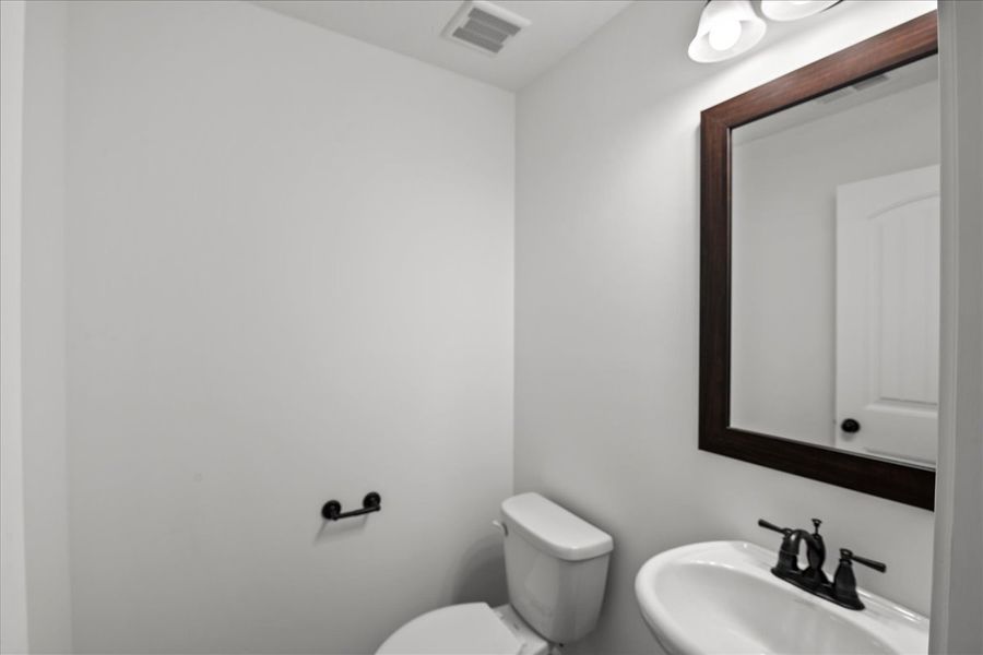 Representative furnished interior of a home built from the Riley by Enchanted Homes in Las Palomas Country Club Estates, La Vernia (Image 9). Representative furnished interior of a home built from the Riley by Enchanted Homes in Las Palomas Country Club Estates, La Vernia (Image 9).