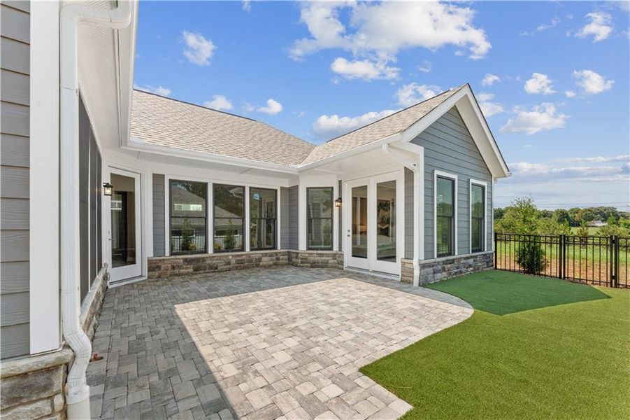 Exterior details and patio area of a home in The Courtyards at Post Road, Cumming (Image 24).