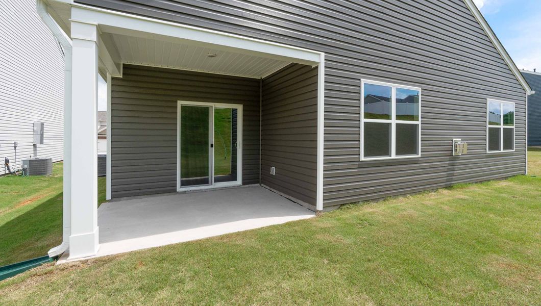 Front exterior of a new home in Woodhaven, Spartanburg, SC, highlighting curb appeal (Image 20). Front exterior of a new home in Woodhaven, Spartanburg, SC, highlighting curb appeal (Image 20).