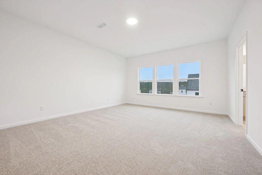 Primary Bed featuring the AW Collection® Foundry - A streamlined space for total rest.