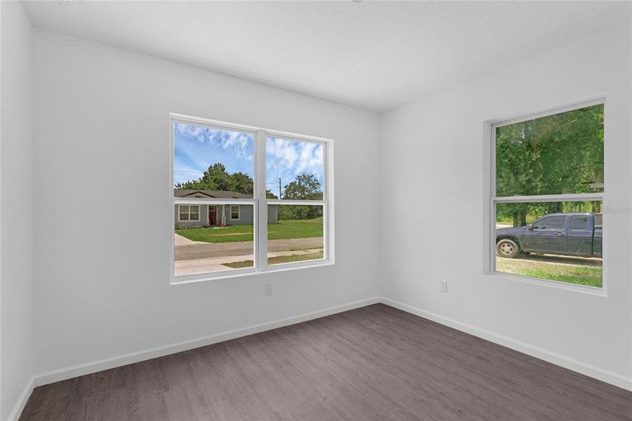 Bedroom two at the front of the house with nice windows and large closet