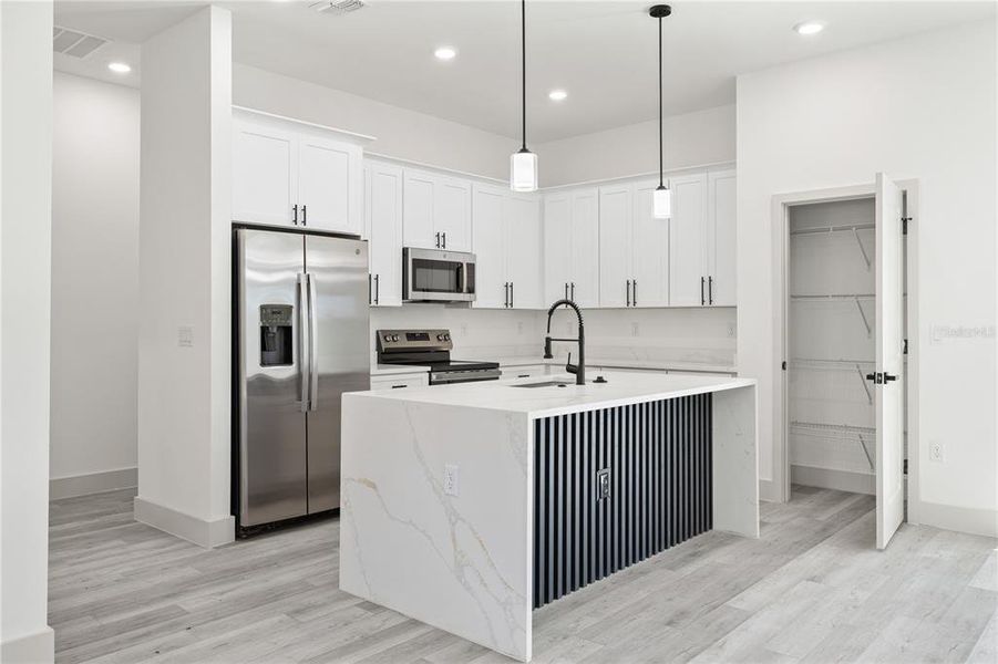 Furnished interior view inside a new home in , Port Charlotte (Image 6). Furnished interior view inside a new home in , Port Charlotte (Image 6).