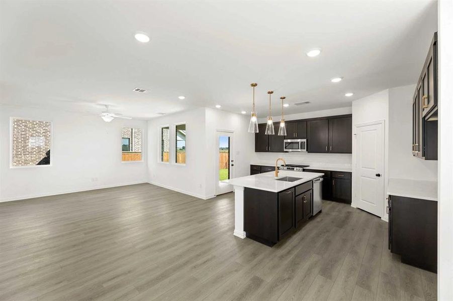 Furnished interior view inside a new home in Creekview Fossil Ridge, Pilot Point (Image 9).