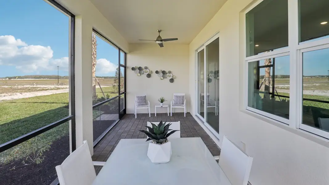 Exterior details and patio area of a home in Palmetto Landing at Babcock Ranch - Tradition, Punta Gorda (Image 2). Exterior details and patio area of a home in Palmetto Landing at Babcock Ranch - Tradition, Punta Gorda (Image 2).
