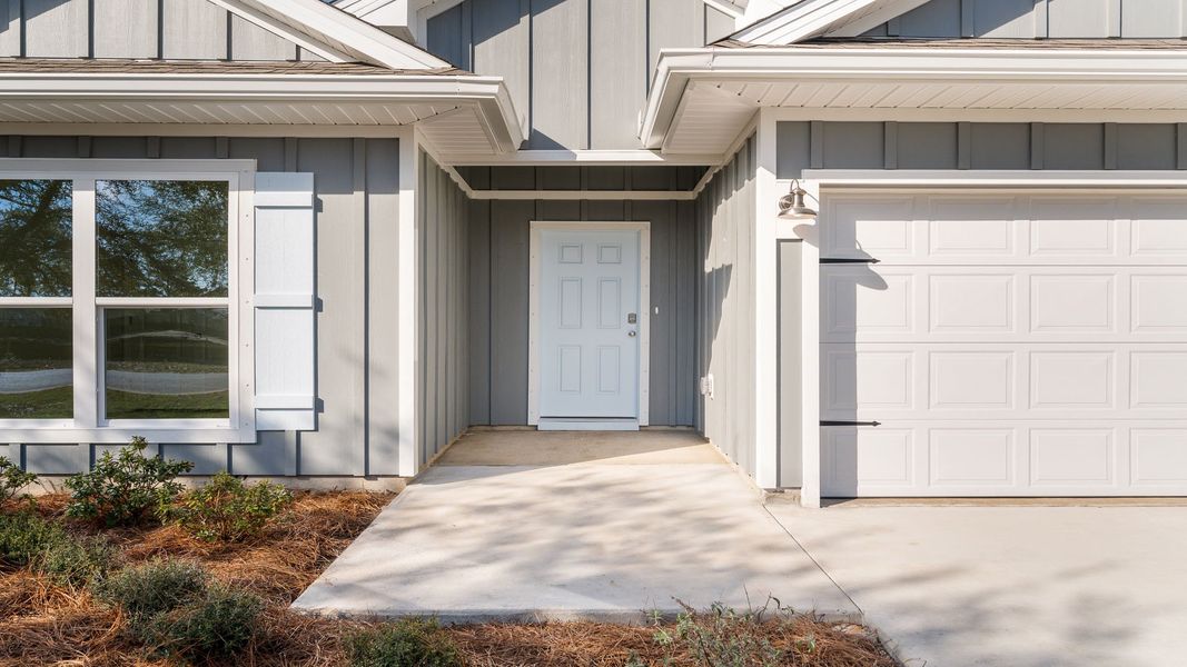 Representative exterior photo of a completed home built from the The Destin by D.R. Horton in Pine Creek and Heron Walk, Port St. Joe, FL (Image 4).